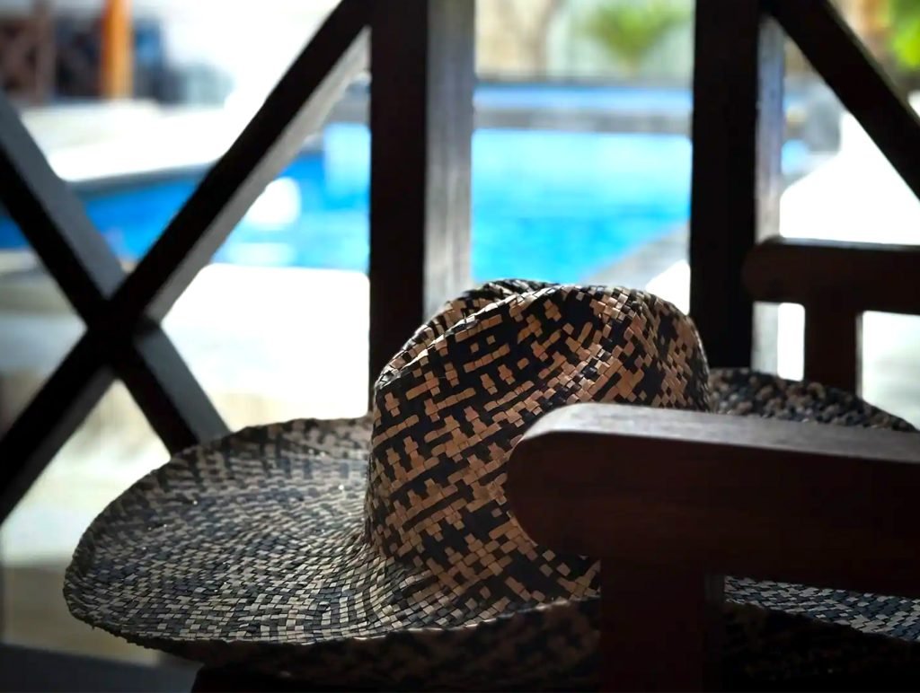 Swimmingpool and hat at Hakuna Matata